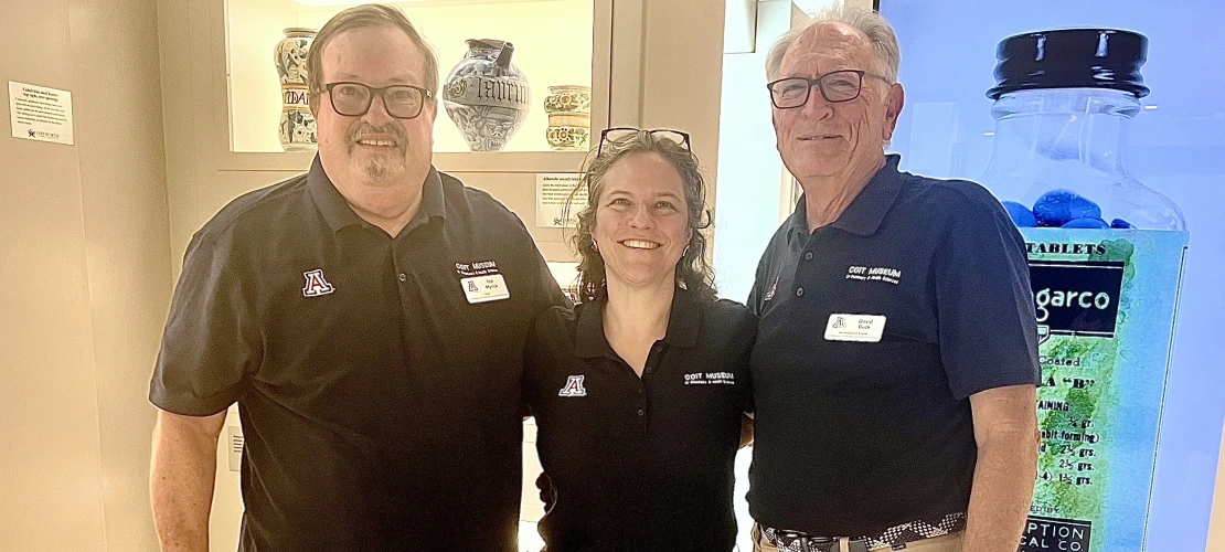 Guides Ted Myrick and David Buck poses with Director Heather Ingram