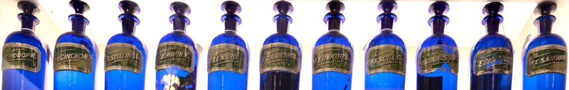 Blue glass pharmacy bottles from the Upjohn Collection