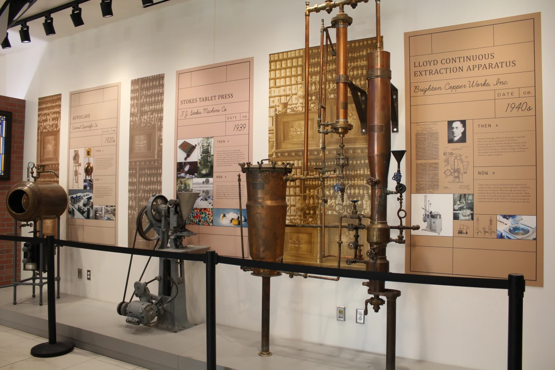large vintage medical equipment is lined up against a wall