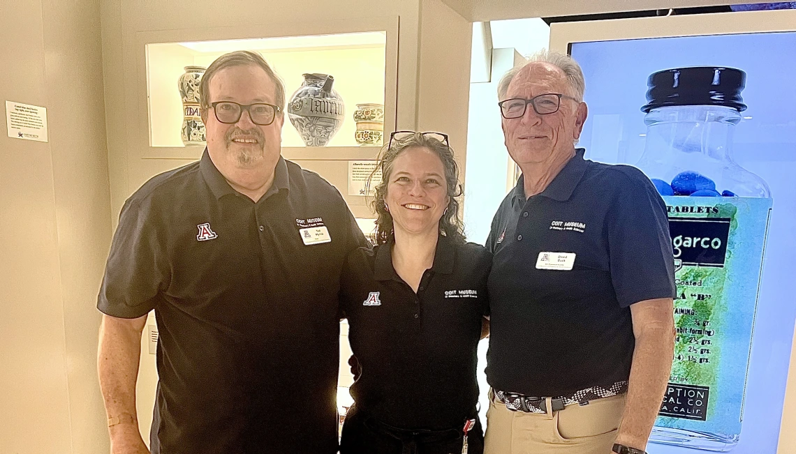 Guides Ted Myrick and David Buck poses with Director Heather Ingram